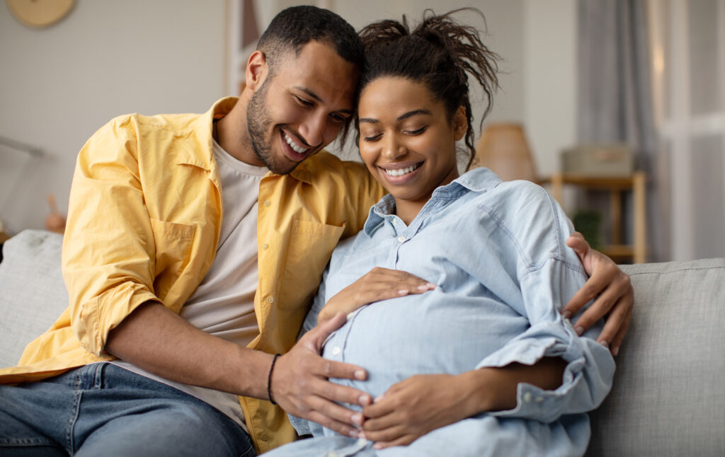 young black couple with baby